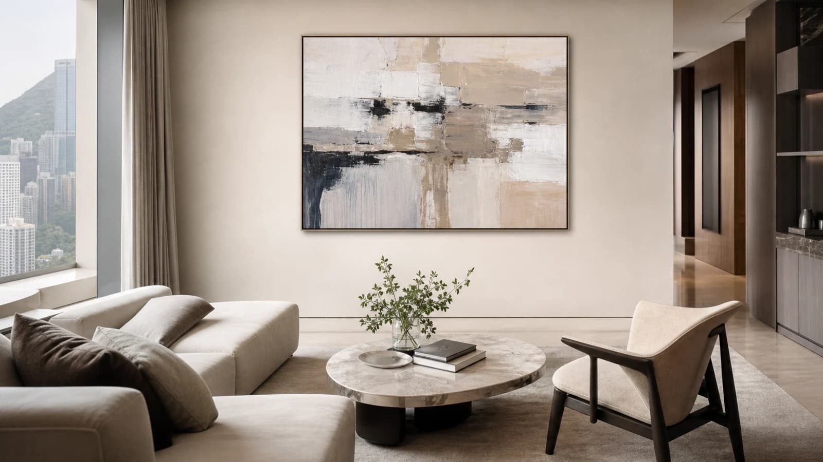Large abstract painting as a focal point in a small, modern Hong Kong living room with minimalist decor.